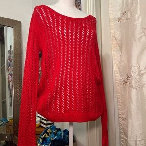 Red knit throw over 

Sweater